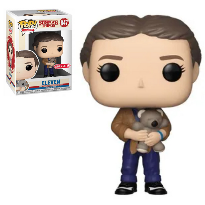 Eleven holding teddy